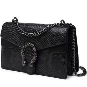 NWOT Faux Python Crossbody shoulder bag.